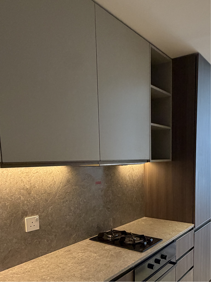 Completed kitchen with integrated cabinetry and stone worktops